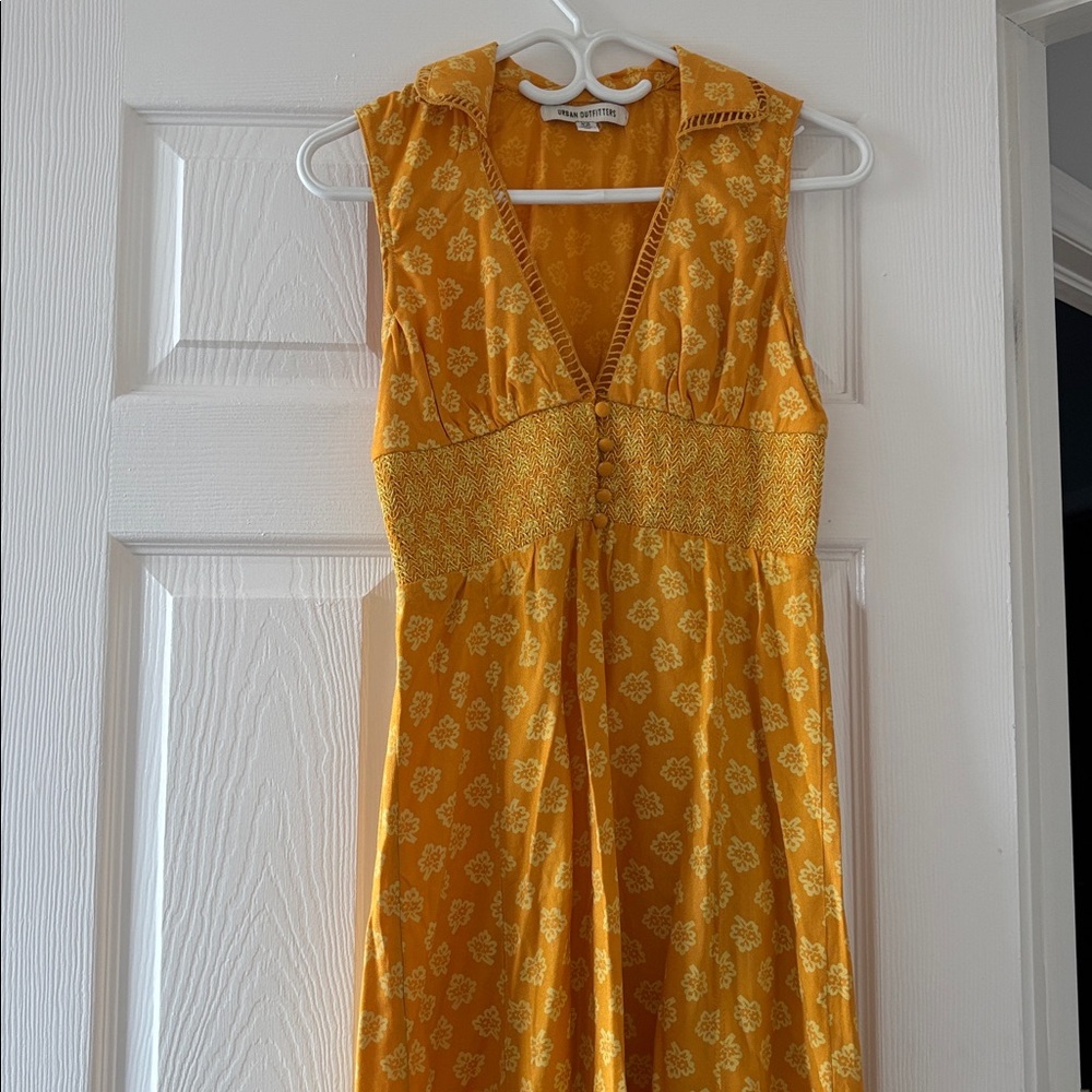 Yellow Sleeveless Dress with Floral Pattern